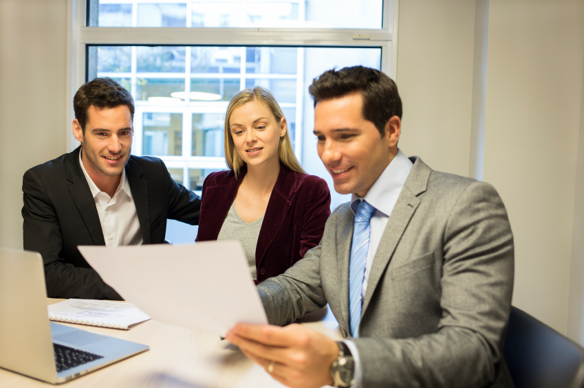 Couple meeting real-estate agent to buy property meeting