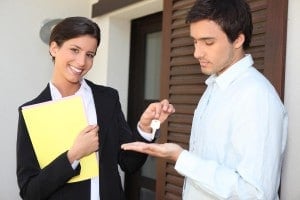 rent lease property tenant keys hand over man woman buy sell unhappy