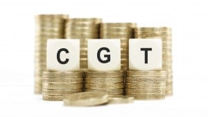 CGT (Capital Gains Tax) on Stacked Coins Isolated White Backgrou