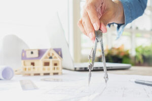Hands Of Engineer Working On Blueprint,construction Concept. Eng